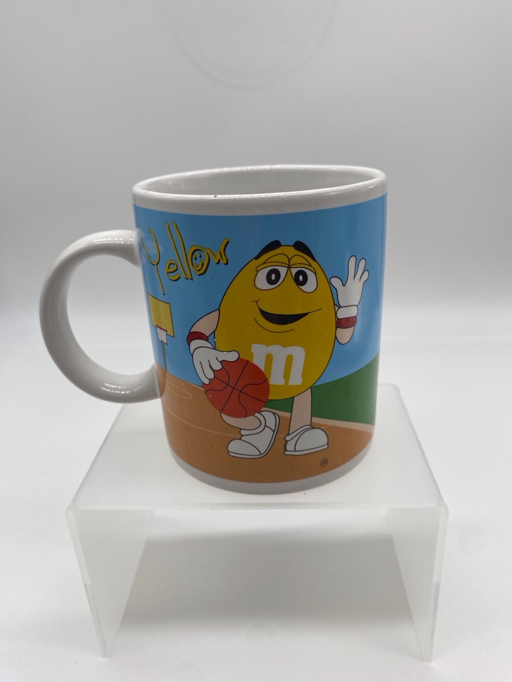 Vintage 2002 M&M'S Yellow Character Basketball Mug with Blue Background